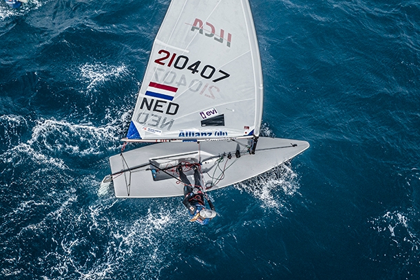 Dutch sailor Marit Bouwmeester is sailing a boat on the water.
